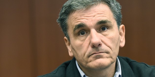 Greece's Finance Minister Euclid Tsakalotos attends an Eurogroup finance ministers' meeting at the European Council, in Brussels on November 9, 2015. AFP PHOTO/Emmanuel Dunand (Photo credit should read EMMANUEL DUNAND/AFP/Getty Images)