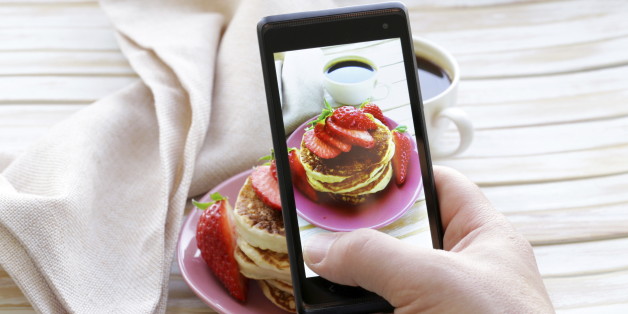 smartphone shot food photo - pancakes for breakfast with fresh strawberries