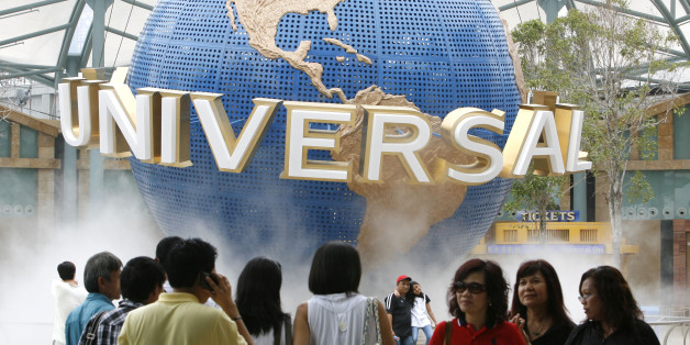 Crowds of people are seen in front of the Universal Studio globe during a media preview at the Universal Studios Singapore, Southeast Asia's first and only at Resorts World Sentosa, a recently opened integrated resort, on Tuesday March 16, 2010 in Singapore.(AP Photo/Wong Maye-E)