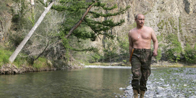 Russian President Vladimir Putin walks along the Khemchik River in the Tuva region of Siberia on Wednesday, Aug. 15, 2007 (AP Photo/ RIA Novosti, Dmitry Astakhov, Presidential Press Service)