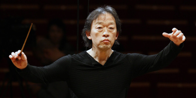 South Korean conductor Chung Myung-whun directs the last rehearsal of members of North Korea's Unhasu Orchestra with the Radio France Philharmonic Orchestra in Paris, Wednesday, March 14, 2012. Chung Myung-whun invited North Korea's Unhasu Orchestra for a unique joint concert with the Radio France Philharmonic Orchestra in Paris on Wednesday night at the Salle Pleyel Concert Hall. (AP Photo/Francois Mori)