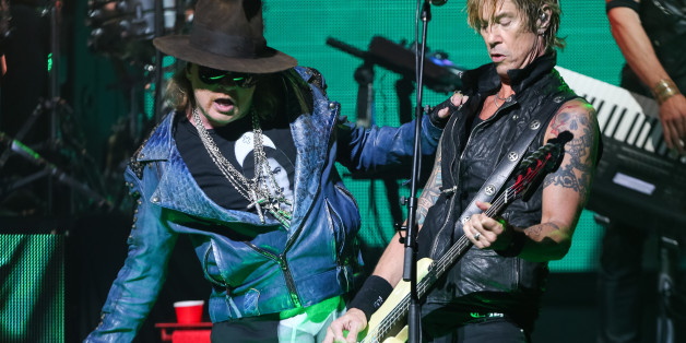 Axl Rose, left, and Duff McKagan of Guns N' Roses perform at the 6th Annual Revolver Golden Gods Award Show at Club Nokia on April 23, 2014 in Los Angeles, California. (Photo by Paul A. Hebert/Invision/AP)
