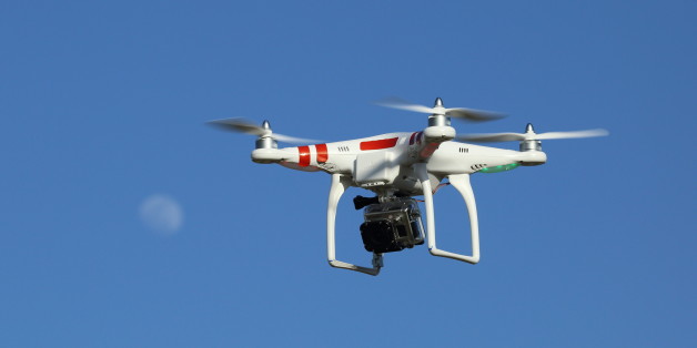 This drone has a Go Pro camera mounted underneath and can go anywhere. The pilot was practicing flying in the high wind. I asked him to get the moon in perspective and he could put it wherever I asked. You can buy one yourself off the Internet. Amazing machine, but some concerns with that camera too.
