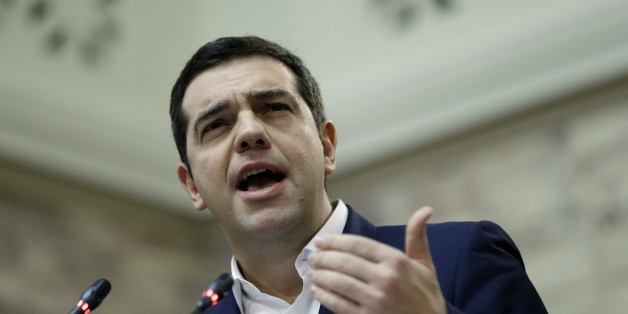 Greece's Prime Minister Alexis Tsipras speaks to the lawmakers of his Syriza party at the parliament in Athens, Tuesday, Dec. 1, 2015. Greece's European creditors have said they will consider some form of debt relief for Greece after they complete a first review of reforms the country must take under its new three-year bailout, an 86 billion euro package agreed on in July with the coalition government of Prime Minister Alexis Tsipras. (AP Photo/Thanassis Stavrakis)