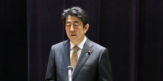 Japanese Prime Minister Shinzo Abe addresses the senior officers of Japan's self defense forces at the Defense Ministry in Tokyo, Wednesday, Dec. 16, 2015. (AP Photo/Shuji Kajiyama)