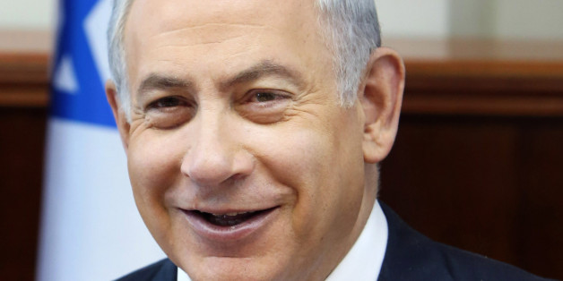 Israel's Prime Minister Benjamin Netanyahu opens the weekly cabinet meeting in Jerusalem, Sunday, Dec. 20, 2015. (Gali Tibbon/Pool Photo via AP)