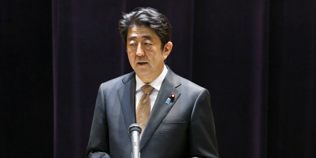 Japanese Prime Minister Shinzo Abe addresses the senior officers of Japan's self defense forces at the Defense Ministry in Tokyo, Wednesday, Dec. 16, 2015. (AP Photo/Shuji Kajiyama)