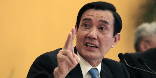 Taiwanese President Ma Ying-jeou speaks to during a press conference at the Shangri-la Hotel on Saturday, Nov. 7, 2015, in Singapore. Chinese President Xi Jinping, and Taiwanese President Ma Ying-jeou shook hands at the start of a historic meeting, marking the first top level contact between the formerly bitter Cold War foes since they split amid civil war 66 years ago. (AP Photo/Chiang Ying-ying)