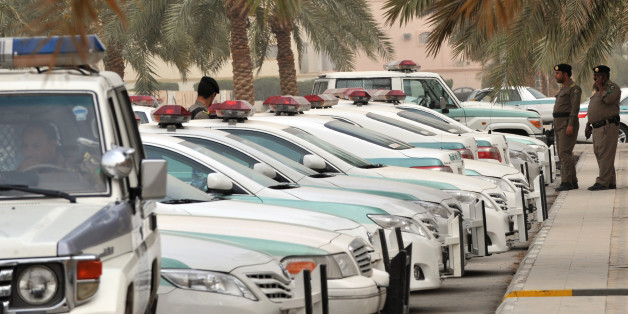 Saudi police cars are parked and policemen stand guard in front of 'Al-rajhi mosque' in central Riyadh on March 11, 2011 as Saudi Arabia launched a massive security operation in a menacing show of force to deter protesters from a planned 'Day of Rage' to press for democratic reform in the kingdom. AFP PHOTO/FAYEZ NURELDINE (Photo credit should read FAYEZ NURELDINE/AFP/Getty Images)