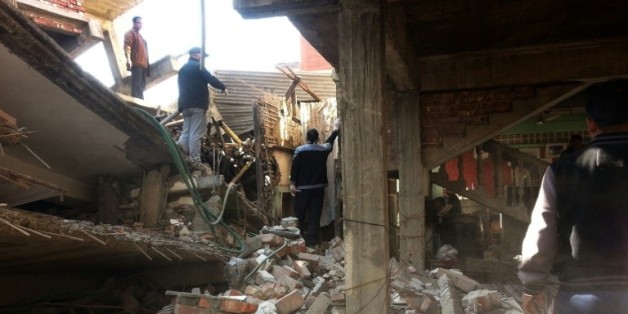Des maisons se sont écroulées le 4 janvier 2016 après un fort séisme de magnitude de 6,7 à Imphal, capitale de l'Etat du Manipur et ville la plus proche de l'épicentre, dans le nord-est de l'Inde