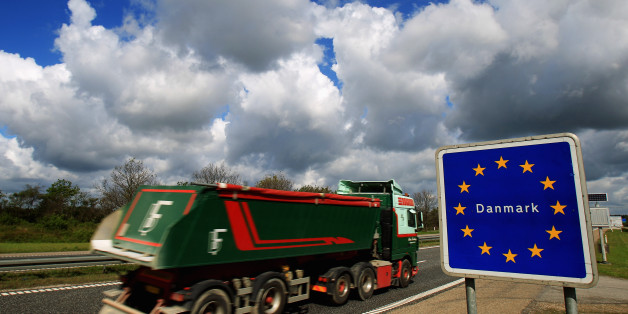 FLENSBURG, GERMANY - MAY 13: Cars and trucks pass the German-Danish border on May 13, 2011 near Flensburg, Germany. Denmark has introduced border controls at its borders to Germany and Sweden in what it says is a necessary step against organized crime. The move has caused an uproar among liberal MPs in the European Parliament, who claim the unilateral action by Denmark goes against the spirit of pan-European cooperation and is only a political stunt meant to placate conservative voters. Denmark