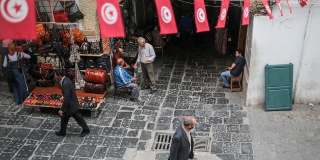 People walk through the Medina market in Tunis, Tunisia, Monday, Oct. 26, 2015. (AP Photo/Mosa'ab Elshamy)