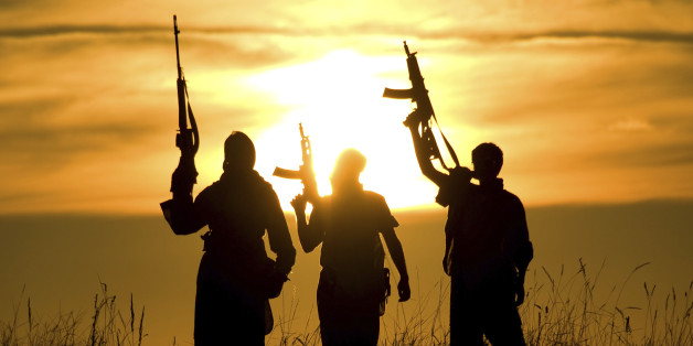 soldiers against a sunset