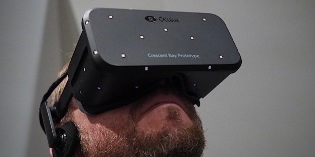 FILE - In this June 11, 2015 file photo, the new Oculus Rift virtual reality headset is on display following a news conference in San Francisco. If youâre a gamer, the appeal of immersing yourself in a virtual world might be obvious. Strap on a headset and you could find yourself in a three-dimensional death match with opponents who could -almost literally - creep up right behind you. (AP Photo/Eric Risberg, File)