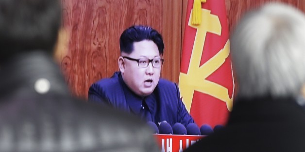 South Koreans watch a TV news program showing North Korean leader Kim Jong Un's New Year speech, at the Seoul Railway Station in Seoul, South Korea, Friday, Jan. 1, 2016. Kim said in an annual New Year speech that he's ready for war if provoked by "invasive" outsiders but stayed away from past threats centering on the country's nuclear weapons and long-range missile ambitions.(AP Photo/Ahn Young-joon)