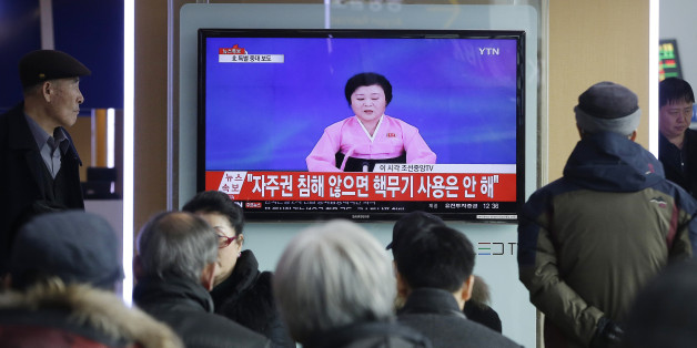 People watch a TV news program showing North Korea's announcement, at the Seoul Railway Station in Seoul, South Korea, Wednesday, Jan. 6, 2016. North Korea said Wednesday it had conducted a hydrogen bomb test, a defiant and surprising move that, if confirmed, would put Pyongyang a big step closer toward improving its still-limited nuclear arsenal. The letters read " Will not use nuclear weapon if autonomy secured." (AP Photo/Ahn Young-joon)