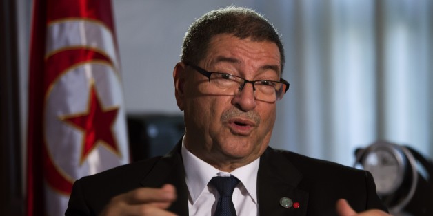 Tunisian Prime Minister Habib Essid speaks with The Associated Press during an interview ahead of a two-day conference in Madrid on combating the type of terrorism targeting foreign tourists that has hit his country twice over the last year, Spain, Tuesday, Oct. 27, 2015. (AP Photo/Emilio Morenatti)