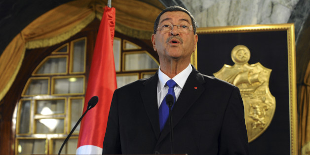 New Tunisian Prime Minister Habib Essid presents his second government to the medias, Monday, Feb.2, 2015 in Tunis. Essid from the nationalist Nida Tunis party that won the most seats in October's election named a new Cabinet on Monday that included a single minister from the powerful Islamist Ennahda Party, Ziad Ladhari as minister of employment. (AP Photo/Hassene Dridi)