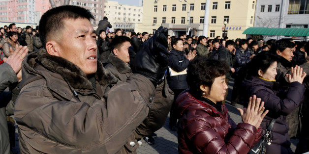 North Koreans watch a news broadcast on a video screen outside Pyongyang Railway Station in Pyongyang, North Korea, Wednesday, Jan. 6, 2016. North Korea said Wednesday it had conducted a hydrogen bomb test, a defiant and surprising move that, if confirmed, would put Pyongyang a big step closer toward improving its still-limited nuclear arsenal. (AP Photo/Kim Kwang Hyon)