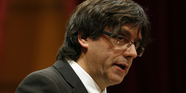 Incoming Catalan President Carles Puigdemont speaks during the investiture session at the Catalonian parliament in Barcelona, Spain, Sunday, Jan. 10, 2016. Catalonia's pro-independence parties have agreed to appoint a new leader to enable the creation of a regional coalition government and reinvigorate a push for independence from Spain by 2017. Carles Puigdemont was selected Saturday to replace Artur Mas as the "Together for Yes" alliance's candidate for regional government leader. (AP Photo/Ma