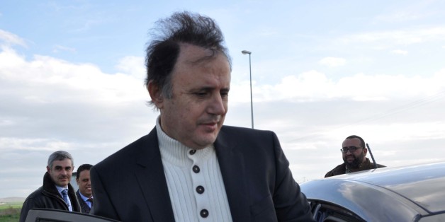 The son-in-law of Tunisia's ousted autocrat Zine El Abidine Ben Ali, businessman Slim Chiboub gets in his car as he leaves Mornaguia prison after being released from prison on January 12, 2016 outside Tunis. / AFP / MOHAMED KHALIL (Photo credit should read MOHAMED KHALIL/AFP/Getty Images)