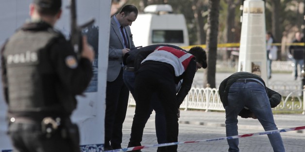 Police search the area at the historic Sultanahmet district after an explosion in Istanbul, Tuesday, Jan. 12, 2016. An explosion killed at least 10 people and injured 15 others Tuesday morning in a historic district of Istanbul popular with tourists, the Istanbul governor's office said. (AP Photo/Lefteris Pitarakis)