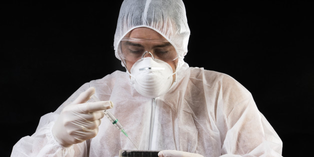 Sanitary technician working with an equipment of protection against the virus. Photo of study realized in Valencia. Spain.