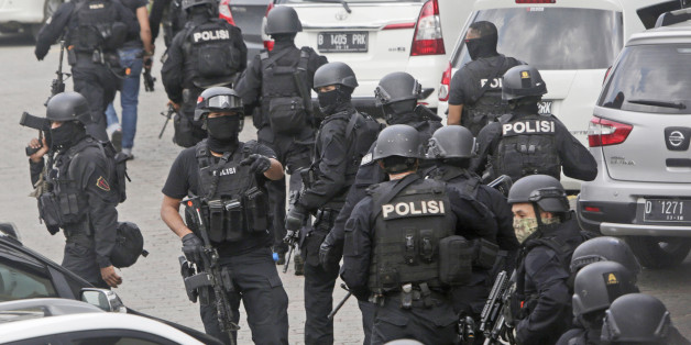 In this Thursday, Jan. 14, 2016, file photo, police officers are deployed near the site of an explosion in Jakarta, Indonesia. Counterterrorism forces apparently did not anticipate Thursdayâs attack, though authorities announced last month that they knew of a credible threat. Security personnel, however, were able to respond rapidly. That was partly luck _ police happened to be in the area on other business _ but it still bolstered the image of security forces and government. (AP Photo/Dita