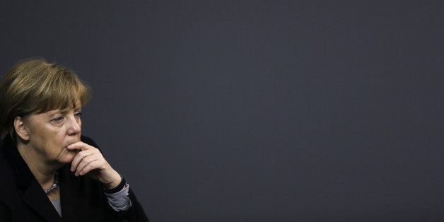 German Chancellor Angela Merkel attends the debate at the German parliament Bundestag on the crime in Cologne during New Year's Eve, in Berlin, Germany, Wednesday, Jan. 13, 2016. (AP Photo/Markus Schreiber)