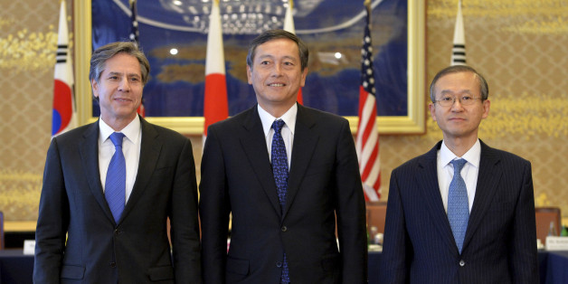 From left, U.S. Deputy Secretary of State Antony Blinken, Japanese Vice Foreign Minister Akitaka Saiki and South Korean First Vice Foreign Minister Lim Sung-nam pose prior to their talks in Tokyo Saturday, Jan. 16, 2016. The trilateral subcabinet-level meeting was held following North Korea's H-bomb claim. (Kazuhiro Nogi/Pool Photo via AP)