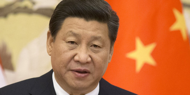 FILE - In this Nov. 12, 2014 file photo, Chinese President Xi Jinping speaks during a joint news conference with U.S. President Barack Obama at the Great Hall of the People in Beijing following their meeting held on the sidelines of the APEC leaders' meeting. An electoral pummeling for Taiwanâs pro-Beijing ruling party and a new spike in pro-democracy protests in Hong Kong have delivered a reality check to Xi just when he was riding a wave of high-profile diplomacy. (AP Photo/Pablo Martine