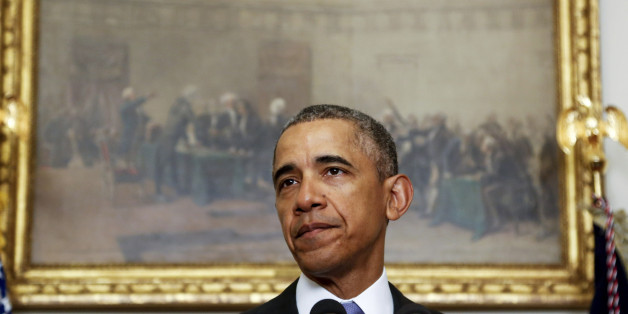 WASHINGTON, DC - JANUARY 17: (AFP OUT) U.S. President Barack Obama delivers a statement on the relations between US and Iran, including the release of the US hostages that were held in Iran, in the cabinet room of the White House on January 17, 2016 in Washington, DC. Obama praised the implementation of a completed nuclear agreement with Iran and the return of five American prisoners that the country was holding resulting in a lifting of economic sanctions. (Photo byAude Guerrucci-Pool/Getty Images)
