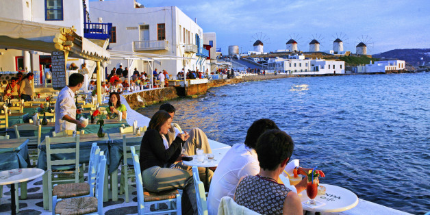 Tourists relaxing at Mykonos