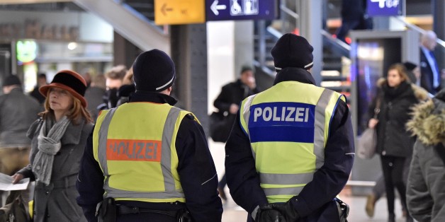 Police patrol in the main train station in Cologne, Germany, Monday, Jan. 18, 2016. Authorities in Germany have arrested a 26-year-old Algerian man on suspicion of committing a sexual assault in Cologne during New Year's celebrations. (AP Photo/Martin Meissner)