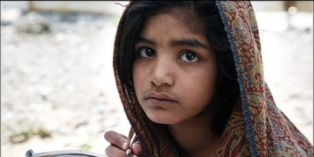 A little girl in Pakistan tries to study in an open field, her poor family lost everything in the recent flood. Please donate generously to help needy families.
Your comments will be appreciated.