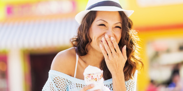 Chinese woman eating ice cream cone