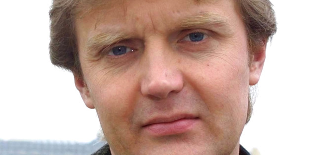 ** FILE ** Alexander Litvinenko, former KGB spy and author of the book "Blowing Up Russia: Terror From Within", photographed at his home in London in this Friday, May 10, 2002 file photo. Poisoned Russian spy Alexander Litvinenko died on Thursday, Nov. 23, 2006 in an intensive care ward, London's University College Hospital said. (AP Photo/Alistair Fuller)