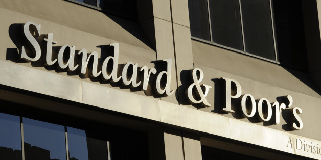 FILE - This Oct. 9, 2011 file photo shows 55 Water Street, home of Standard & Poor's, in New York. S&P said Monday, Feb. 4, 2013, the U.S. government is expected to file civil charges against Standard & Poor's Ratings Services, alleging that it improperly gave high ratings to mortgage debt that later plunged in value and helped fuel the 2008 financial crisis. The charges would mark the first enforcement action the government has taken against a major rating agency involving the worst financial crisis since the Great Depression. (AP Photo/Henny Ray Abrams, File)