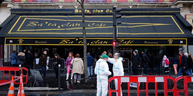 City workers clean the sidewalk and the street in front of the Bataclan concert hall in Paris on December 22, 2015, after the sidewalk in front of the venue was once again made accessable to pedestrians.
A coordinated series of gun and bomb attacks at several sites in Paris on November 13, including the Bataclan concert hall, left 130 dead. / AFP / FRANCOIS GUILLOT (Photo credit should read FRANCOIS GUILLOT/AFP/Getty Images)