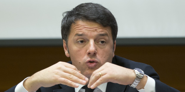 Italian Premier Matteo Renzi answers reporters' questions during a year-end press conference in Rome, Tuesday, Dec. 29, 2015. (AP Photo/Alessandra Tarantino)