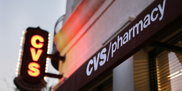 A CVS Pharmacy is seen in Orlando, Fla., Wednesday, Feb. 2, 2011. Drugstore chain and pharmacy benefits manager CVS Caremark Corp. said Thursday, Feb. 3, that its profit fell 2 percent in the fourth quarter on lower revenue because of client losses and fewer Medicare prescription drug program members.(AP Photo/John Raoux)