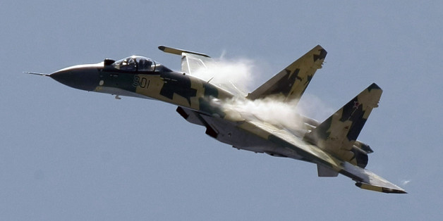 FILE - In this Tuesday, Aug. 18, 2009 file photo, a Russian Sukhoi Su-35 air force jet flies during MAKS-2009 (the International Aviation and Space Show) in Zhukovsky, Russia, Tuesday, Aug. 18, 2009. Mikhail Simonov, one of Russia's top aircraft designers and creator of famous Sukhoi fighter jets has died. He was 81. (AP Photo/Misha Japaridze, file)
