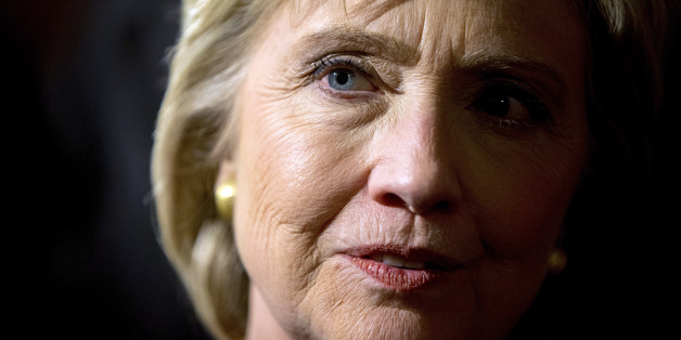 Democratic presidential candidate Hillary Clinton speaks with a member of the audience after speaking at a rally at the Steyer Opera House at Hotel Winneshiek in Decorah, Iowa, Tuesday, Jan. 26, 2016. (AP Photo/Andrew Harnik)