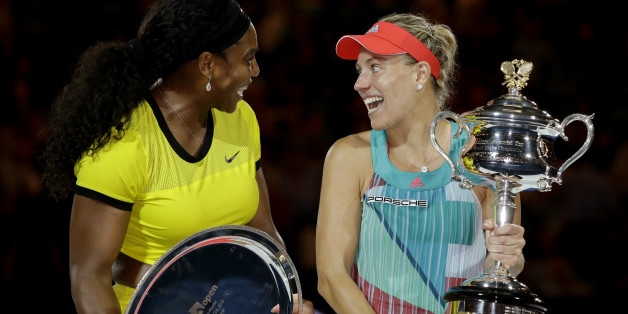 Angelique Kerber, right, of Germany talks with Serena Williams of the United States during the awarding ceremony after winning the women's singles final at the Australian Open tennis championships in Melbourne, Australia, Saturday, Jan. 30, 2016.(AP Photo/Aaron Favila)