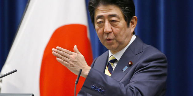 Japanese Prime Minister Shinzo Abe speaks to the media during the New Year's press conference at his official residence in Tokyo, Monday, Jan. 4, 2016. (AP Photo/Shizuo Kambayashi)