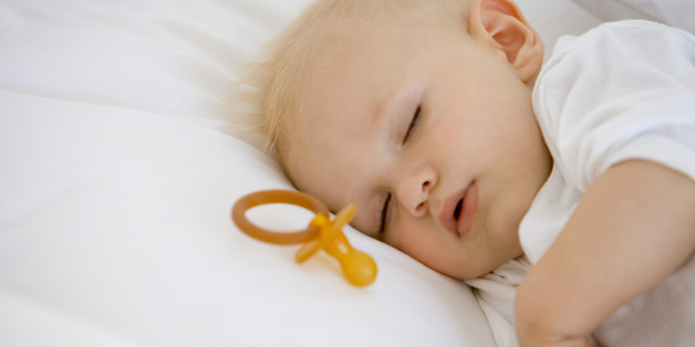 Sleeping baby with pacifier
