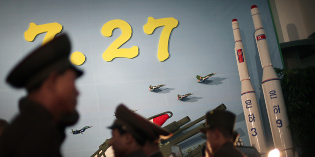FILE - In this July 26, 2013 file photo, North Korean soldiers tour near model versions of the Unha 3 space launch vehicle, left, which successfully delivered North Koreaâs first satellite into Earth orbit, and the Unha 9, which would carry a lunar orbiter, on display at an annual flower show held in honor of national founder Kim Il Sung and his son Kim Jong Il in Pyongyang, North Korea. North Koreaâs announcement of plans to launch a long-range rocket during a visit to Pyongyang by a top Chinese envoy will likely be seen as yet another sign of gross disrespect toward its chief ally. (AP Photo/Wong Maye-E, File)