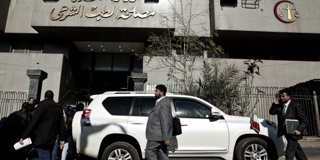 A vehicle belonging to the Italian ambassador is parked outside Zeinhom morgue, where the body of Giulio Regeni, a 28-year-old graduate student, is held, Thursday, Feb. 4, 2016. The body of the missing Italian student was found with signs of torture, including multiple stab wounds and cigarette burns, by the side of a highway on the outskirts of the Egyptian capital, an investigating prosecutor told The Associated Press on Thursday.(AP Photo/Nariman El-Mofty)