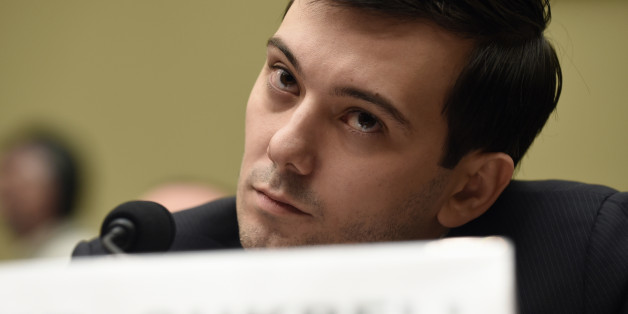 Pharmaceutical chief Martin Shkreli listens on Capitol Hill in Washington, Thursday, Feb. 4, 2016, during the House Committee on Oversight and Reform Committee hearing on his former company's decision to raise the price of a lifesaving medicine. Shkreli refused to testify before U.S. lawmakers who excoriated him over severe hikes for a drug sold by a company that he acquired. (AP Photo/Susan Walsh)