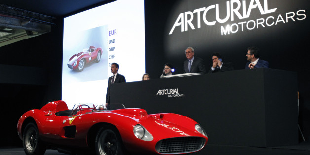 PARIS, FRANCE - FEBRUARY 05: 1957 Ferrari 335 S Spider Scaglietti model from the Pierre Bardinon collection is displayed during the auction at Retromobile show by the Artcurial auction house on February 05, 2016 in Paris, France. Estimated between 28 and 32 million euros, the 335 Sport Scaglietti finally sold for 32,075 million euros (35,695 million dollars), becoming the second most expensive car in the world behind the Ferrari 250 GTO 1962 which sold for for 34,025 million euros (37,868 million dollars) (Photo by Chesnot/Getty Images)